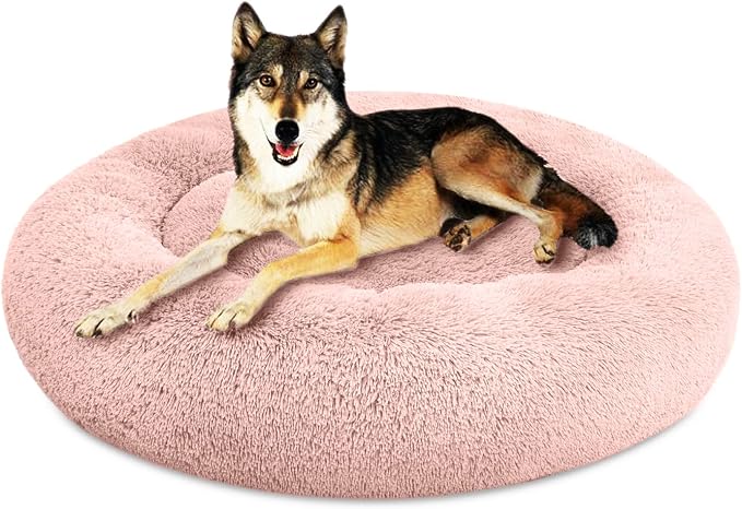 SAVFOX 45 inches Calming Donut Dog Bed - 3X Durable Plush Faux Fur, Machine Washable & Non-Slip, Fits up to 150 lbs, Pink