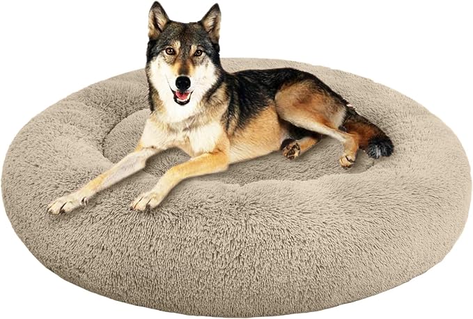 SAVFOX 45 inches Calming Donut Dog Bed - 3X Durable Plush Faux Fur, Machine Washable & Non-Slip, Fits up to 150 lbs, Beige