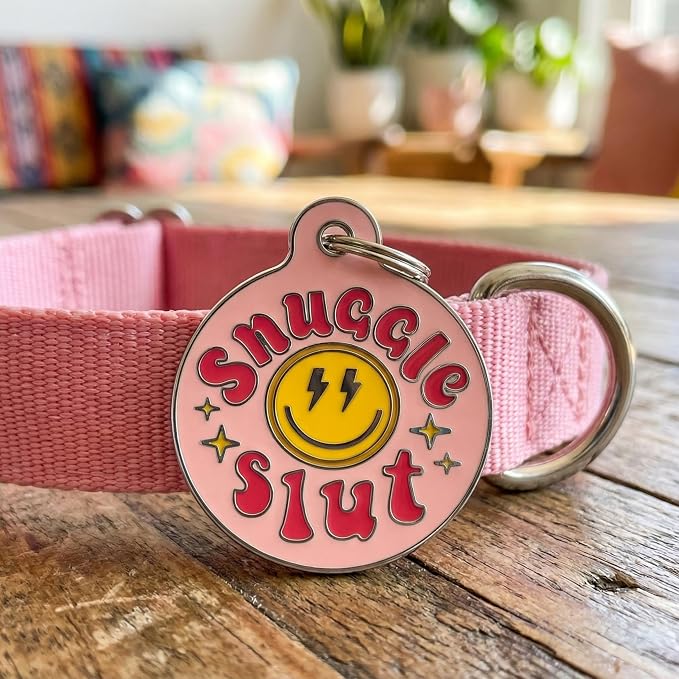 Bad Tags Personalized Dog and Cat ID Tags in 25+ Designs and 2 Sizes - 5 Lines of Custom Engraved Text - Funny Cute Personalized Pet Tags (Snuggle Sl*t - Pink, Small (1 inch))