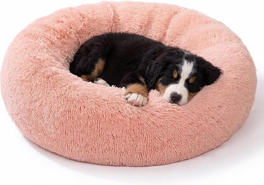 SAVFOX 23 inches Calming Donut Dog Bed - 3X Durable Plush Faux Fur, Machine Washable & Non-Slip, Fits up to 25 lbs, Pink