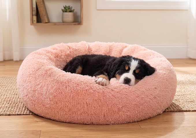 SAVFOX 23 inches Calming Donut Dog Bed - 3X Durable Plush Faux Fur, Machine Washable & Non-Slip, Fits up to 25 lbs, Pink