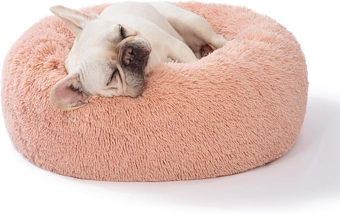 SAVFOX 23 inches Calming Donut Dog Bed - 3X Durable Plush Faux Fur, Machine Washable & Non-Slip, Fits up to 25 lbs, Pink