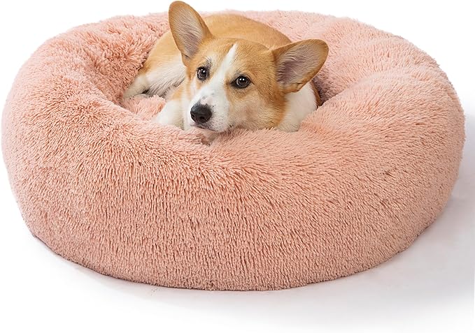 SAVFOX 30 inches Calming Donut Dog Bed - 3X Durable Plush Faux Fur, Machine Washable & Non-Slip, Fits up to 45 lbs, Pink